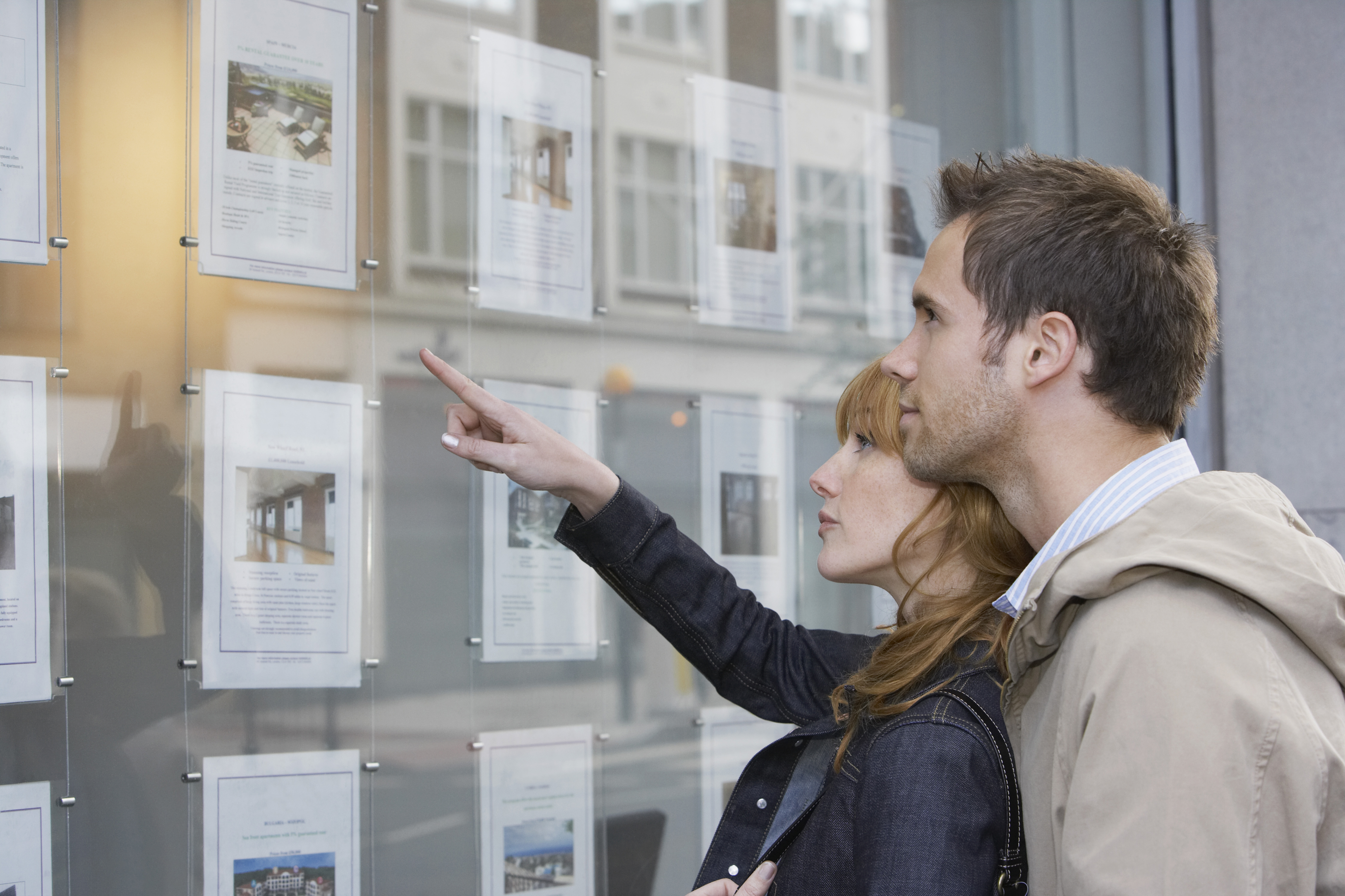 Couple looking at homes